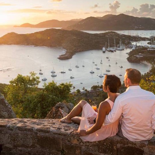Couple overlooking Shirley heights in Antigua and Barbuda