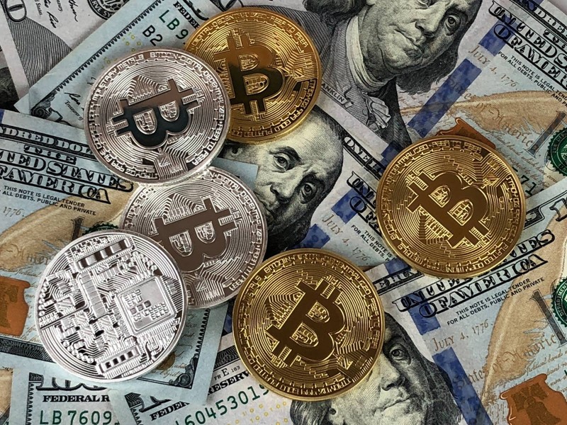 Cryptocurrency coins with US Dollars