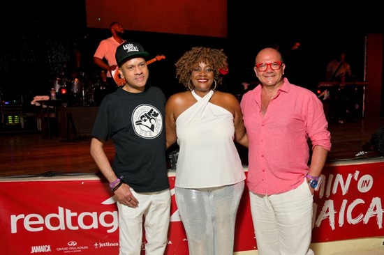 Angella Bennett, Regional Director, Canada, JTB (centre) with DJ Clymaxxx (left) and Sam Youssef, Senior Vice President, Marketing &amp; Partnerships, H.I.S.-Red Label Vacations Inc., parent company of redtag.ca (right).