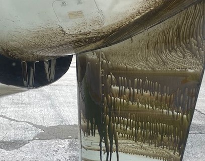 Engine oil leaking from Fly Montserrat Flight 