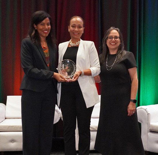 Kendra Hopkin Stewart, President of the Grenada Hotel &amp; Tourism Association (center), accepts the late Sir Royston Hopkin’s Icon of Caribbean Hospitality award from CHTA President Nicola Madden-Greig and CHTA Acting CEO and Director General, Vanessa Ledesma (right).